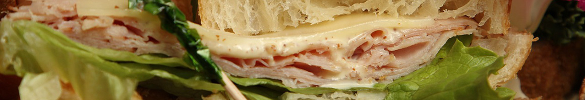 Eating Sandwich at Corner Bakery Cafe restaurant in Highlands Ranch, CO.